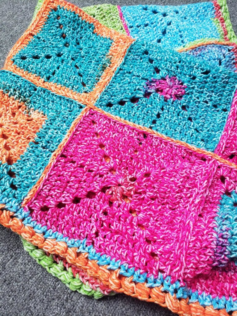 Colorful crocheted baby blanket