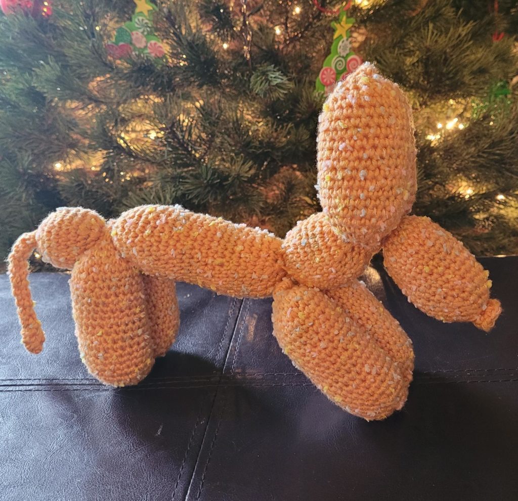 Crocheted orange puppy